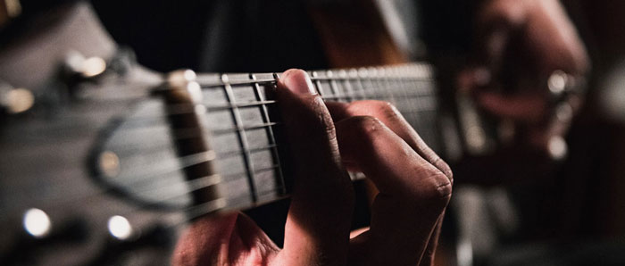man playing the guitar