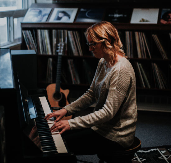 woman playing the piano